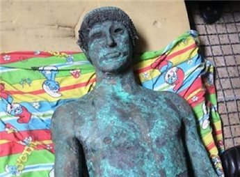 A picture taken in Gaza on Sept. 19, 2013 shows a 2,500-year-old bronze statue of the Greek god Apollo discovered by Palestinian fishermen in August (Gaza's Ministry of Tourism/AFP)